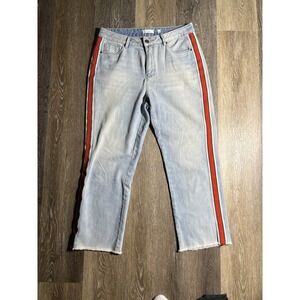 Light blue denim straight leg jeans with red stripe